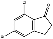 5-ブロモ-7-クロロ-1-インダノン 化学構造式