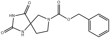 benzyl 2,4-dioxo-1,3,7-triazaspiro[4.4]nonane-7-carboxylate Struktur