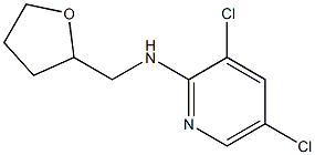 3,5-dichloro-N-(oxolan-2-ylmethyl)pyridin-2-amine