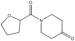 1-(tetrahydrofuran-2-ylcarbonyl)piperidin-4-one 化学構造式