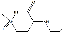 N-(1-methyl-1,3-dioxo-3,4,5,6-tetrahydro-1lambda~6~,2-thiazin-4-yl)formamid e Struktur