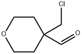 4-(chloromethyl)oxane-4-carbaldehyde Structure