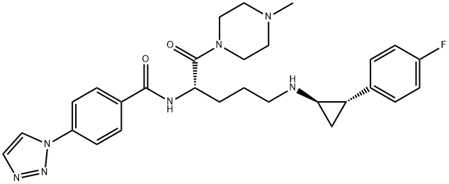 Benzamide, N-[(1S)-4-[[(1R,2S)-2-(4-fluorophenyl)cyclopropyl]amino]-1-[(4-methyl-1-piperazinyl)carbonyl]butyl]-4-(1H-1,2,3-triazol-1-yl)- 化学構造式