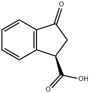 1H-Indene-1-carboxylic acid, 2,3-dihydro-3-oxo-, (1R)- Struktur