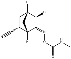 (1S,2R,4R,5R,6E)-5-クロロ-6-[[[(メチルアミノ)カルボニル]オキシ]イミノ]ビシクロ[2.2.1]ヘプタン-2-カルボニトリル 化学構造式
