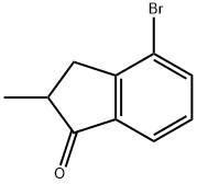 4-ブロモ-2-メチル-1-インダノン 化学構造式