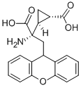(2S)-2-アミノ-2-[(1S,2S)-2-カルボキシシクロプロピル]-3-(9H-キサンテン-9-イル)プロパン酸 化学構造式