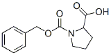 1-phenylmethoxycarbonylpyrrolidine-2-carboxylic acid 化学構造式