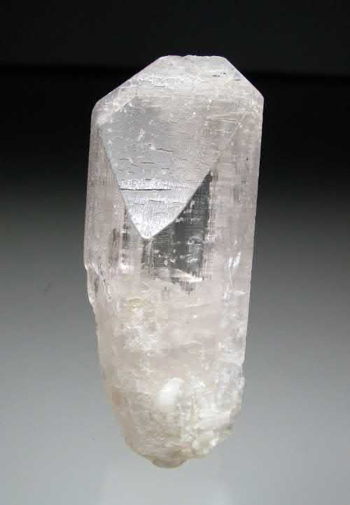 FIGURE 4. Danburite, CaB2Si2O8, single 6 cm terminated pink crystal.