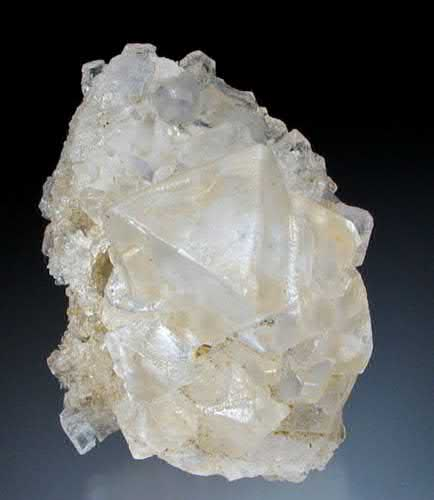 FIGURE 1. Cluster of nearly colorless, well-formed octahedral sylvite, KCl, crystals to 2.5 cm.